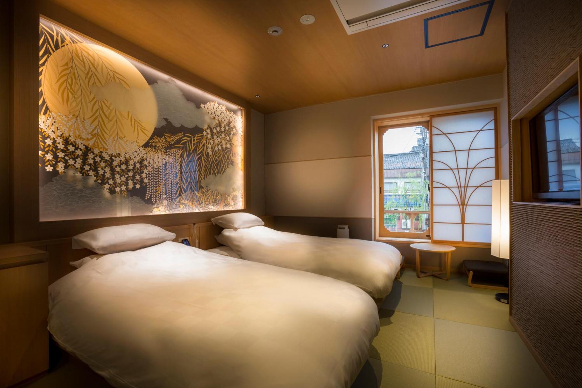 Kinosaki Onsen Tokitotoki Hotel Toyooka  Kamer foto